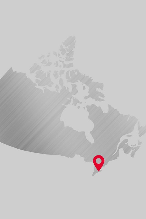 Bild einer Weltkarte für den neuen Standort in Kanada im Jahr 2002.